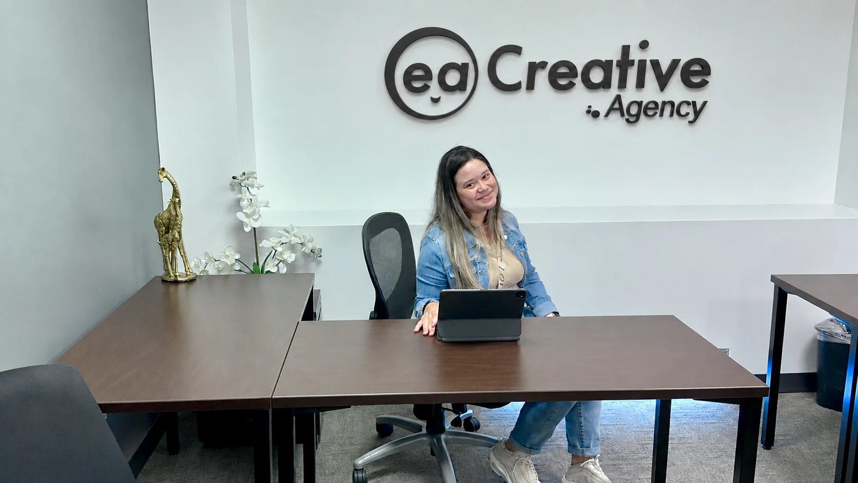 EA Creative office with our wall logo